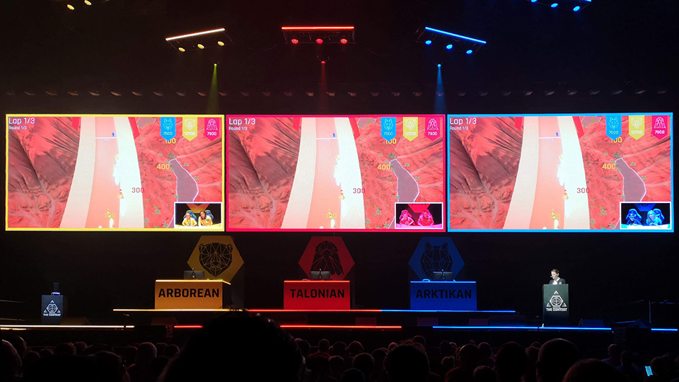 DanTDM commentating on the Speed game during the Manchester Arena showing of The Contest